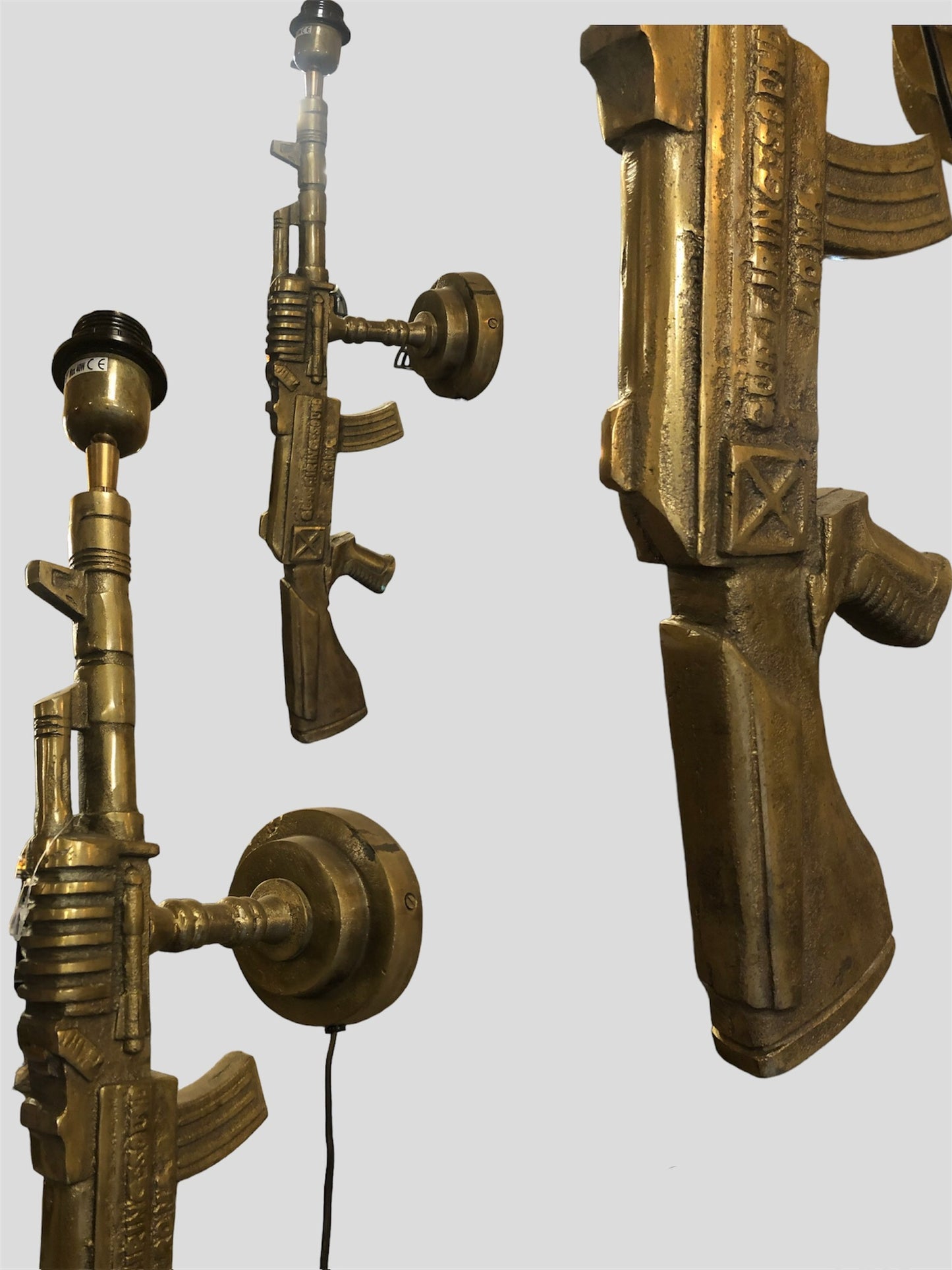 Wandlamp Kalashnikov goud